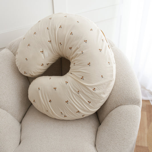 Almofada de amamentação para bebé e mamã em tons neutros com motivo limões.