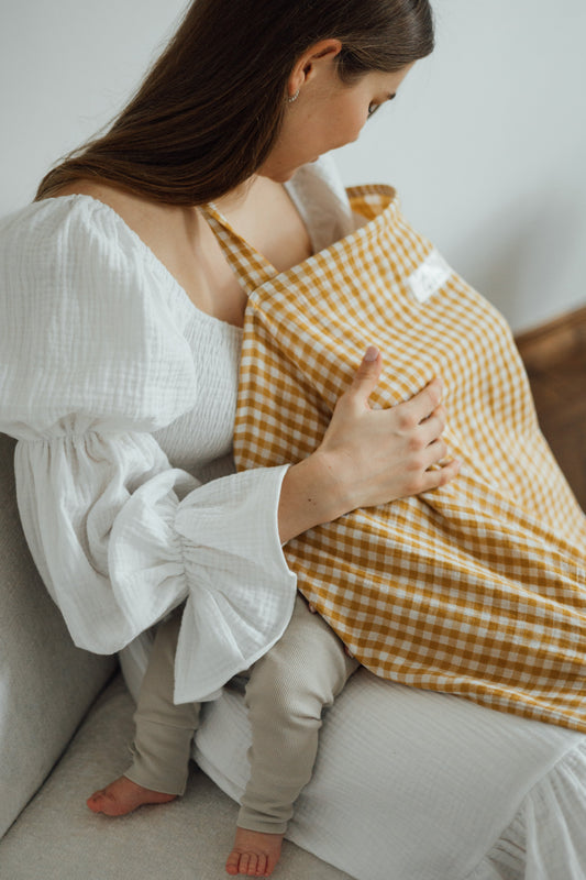 TISU é um avental de amamentação criado para criar uma atmosfera confortável para mamã e bebé, facilmente lavável e projetado para ser leve e respirável.