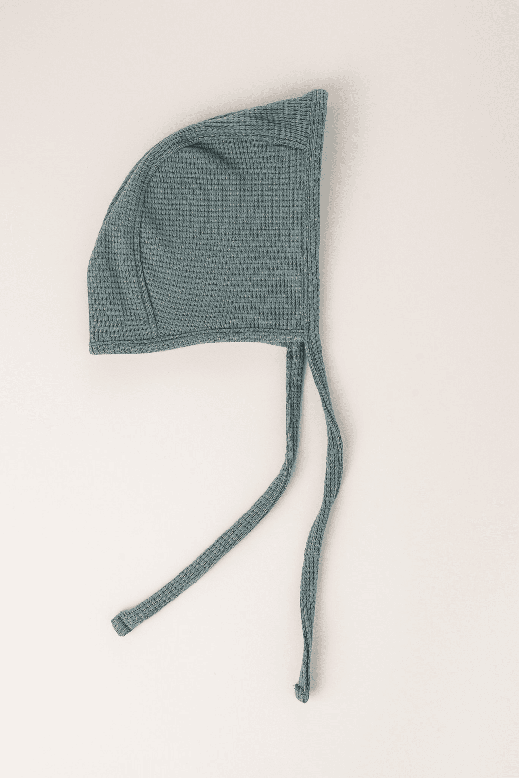 Knitted baby bonnet sage green