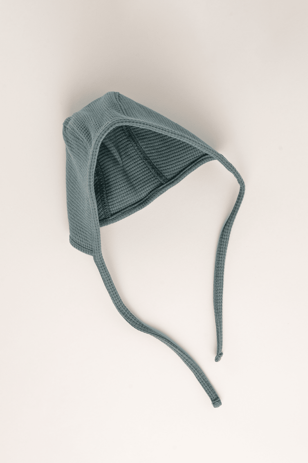 Knitted baby bonnet sage green