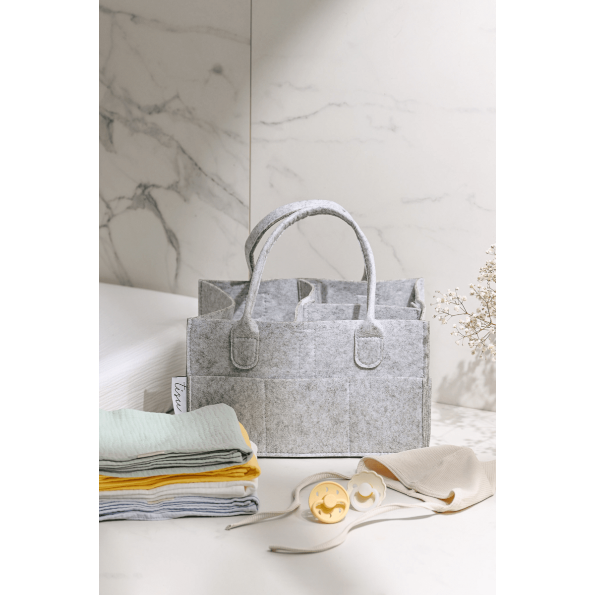 Bolso organizador de pañales gris