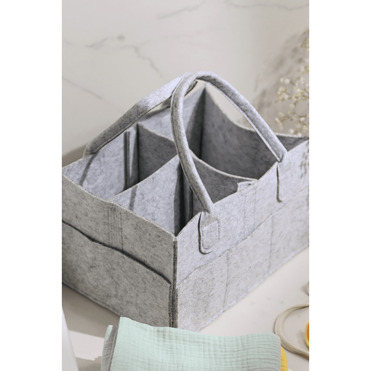 Bolso organizador de pañales gris