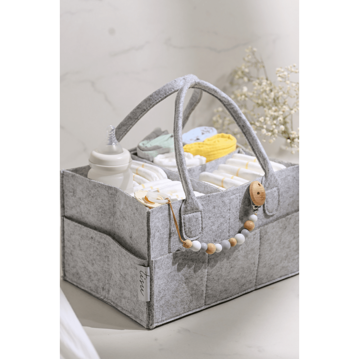 Bolso organizador de pañales gris