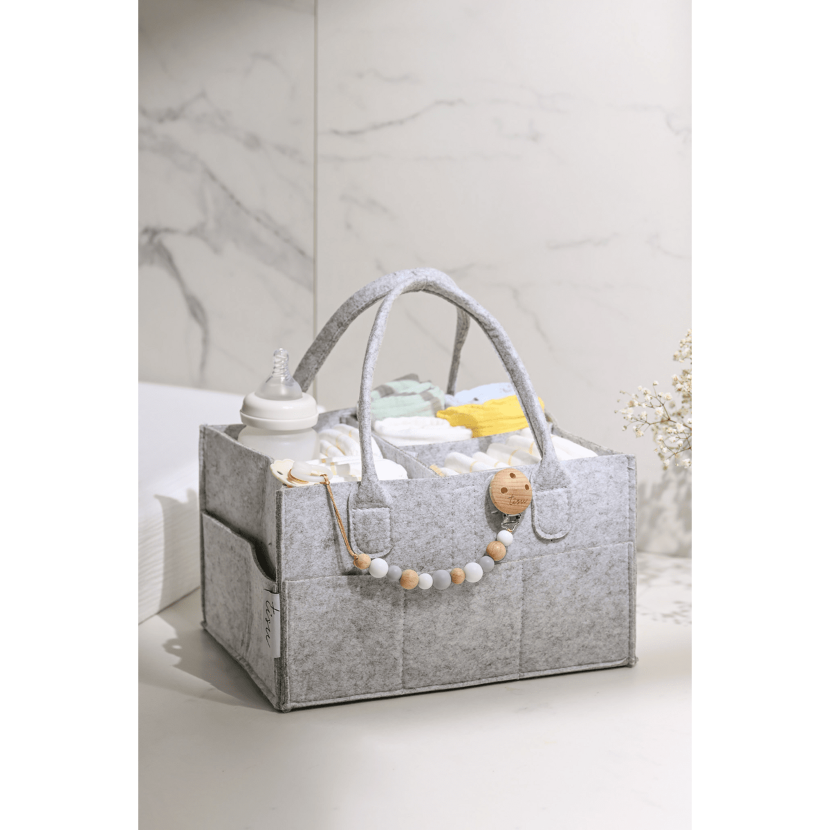 Bolso organizador de pañales gris