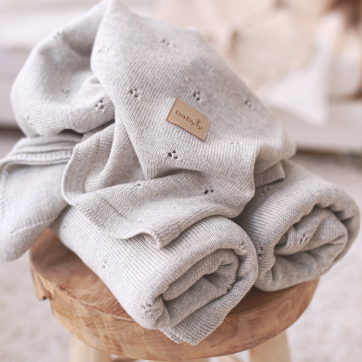 Manta de bebé em lã merino em malha cinza