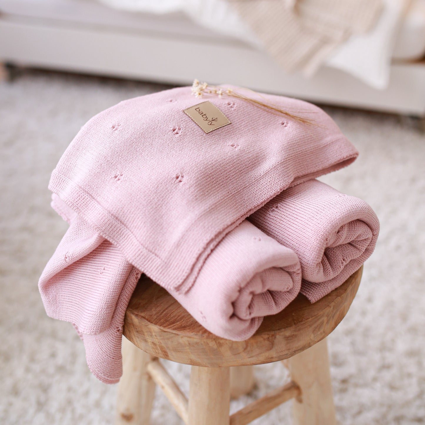 Manta de bebé em lã merino em malha rosa