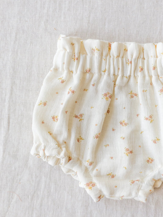 Tapa-fraldas para bebé recém-nascido em musselina 100% algodão, com padrão floral.