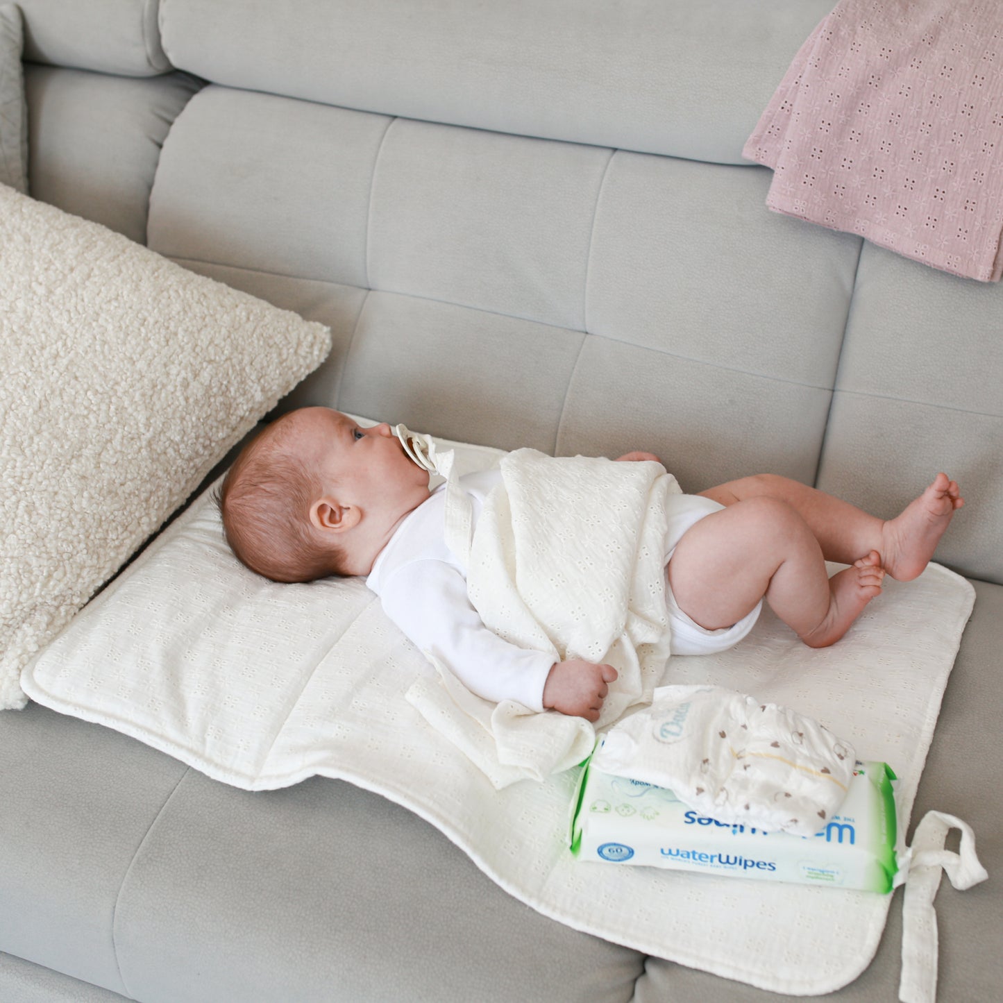 Raw embroidered muslin changing table