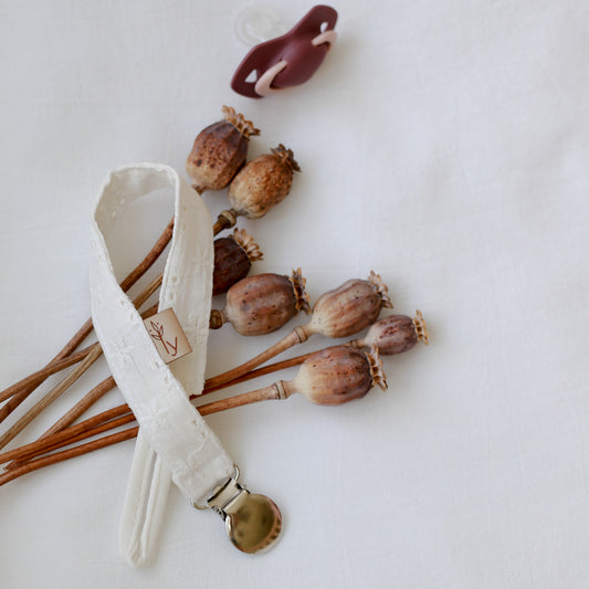 Embroidered muslin pacifier holder ecru