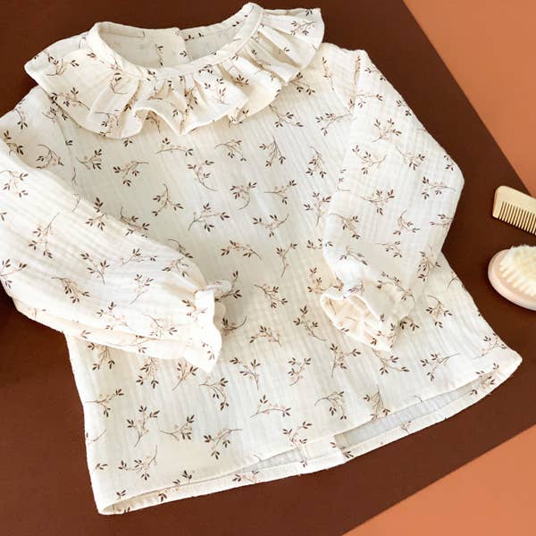 Blusinha flores e folhinhas bege (-50%)
