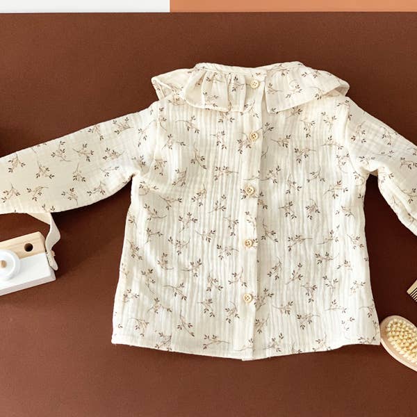 Blusinha flores e folhinhas bege (-50%)