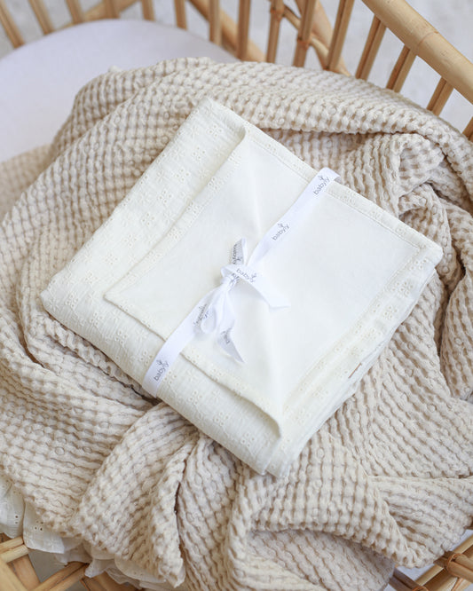 Embroidered muslin swaddle