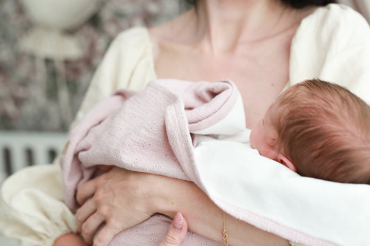 Pink embroidered muslin swaddle