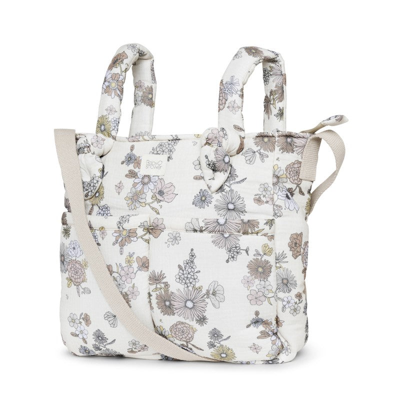 Mala de maternidade com padrão floral, ideal para organizar tudo o que o bebé precisa nos passeios ou na maternidade, em tecido macio e resistente, com bolsos interiores.